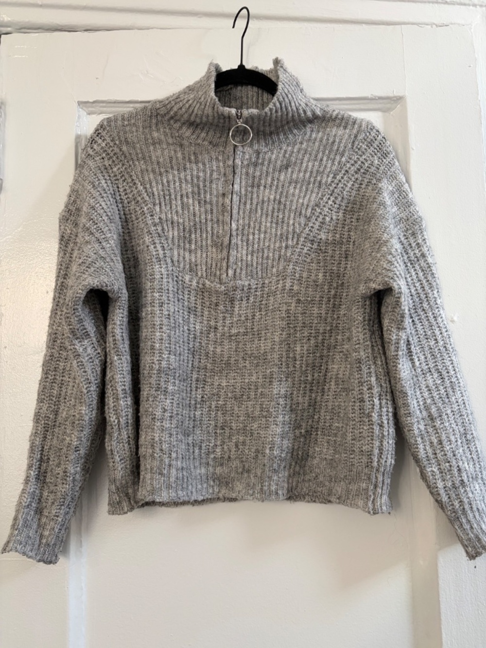 Cozy knit sweater—perfect to snuggle up in this fall